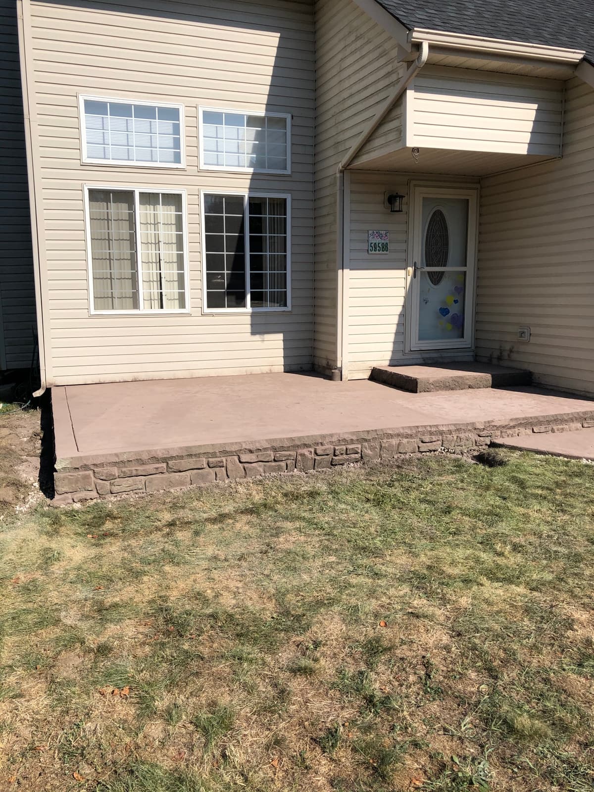 Backyard Patio with Stone Border